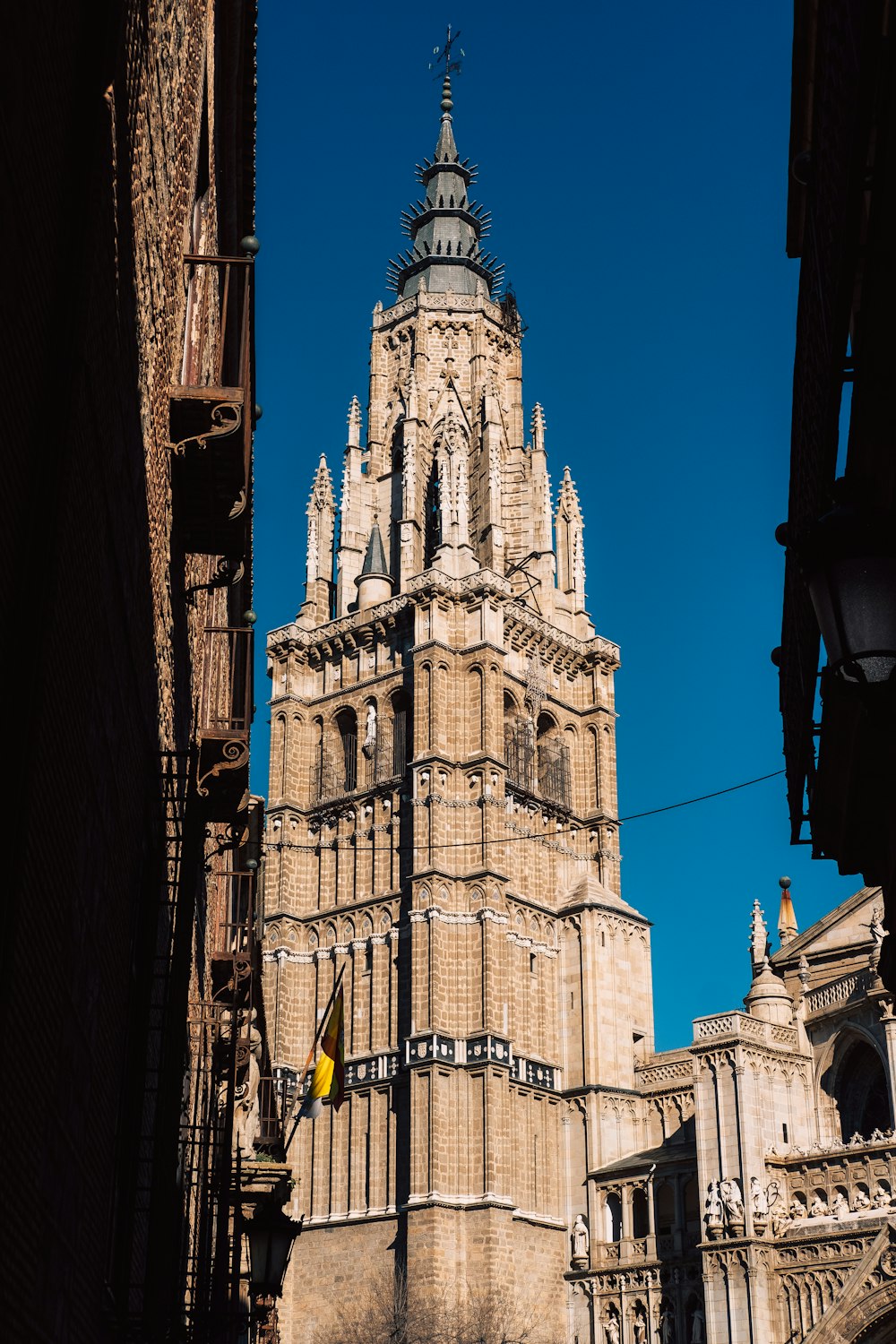 a tall tower with a clock on the top of it