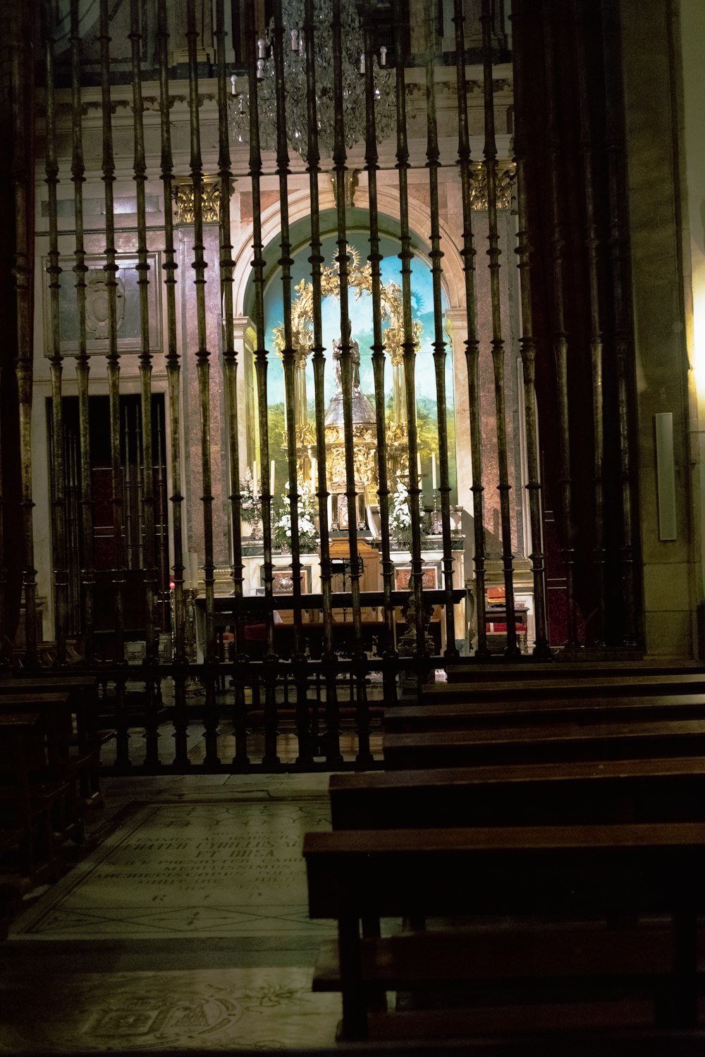 a view of a church through a gate