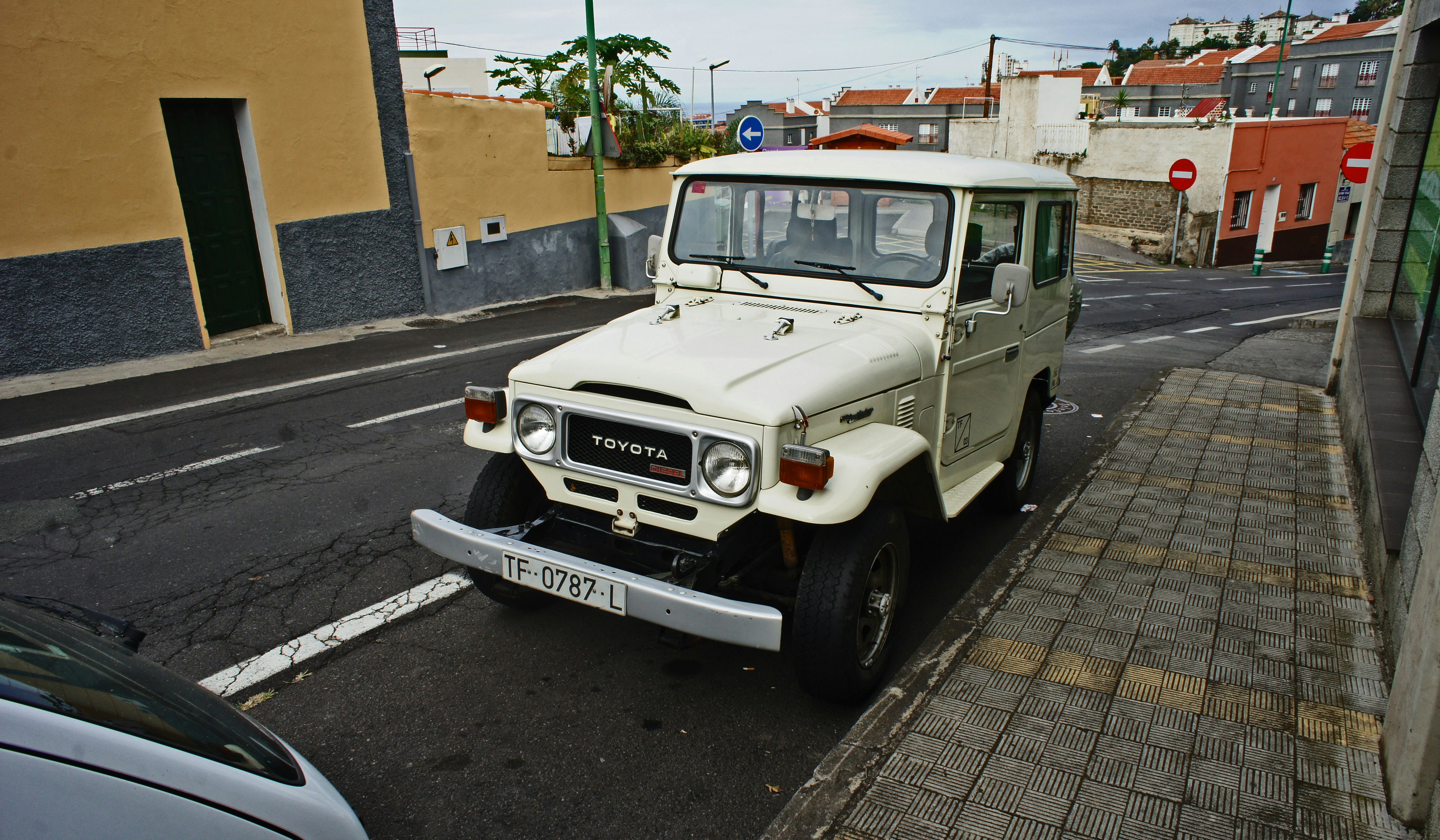 White Toyota Land Cruiser V8 parked on a city street in Nairobi