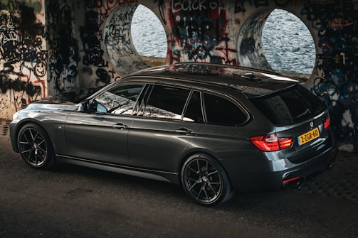 Everyday commuter vehicle sporting a sleek, removable vinyl sticker campaign targeting city neighborhoods.