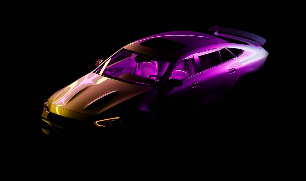 a purple and yellow car in the dark