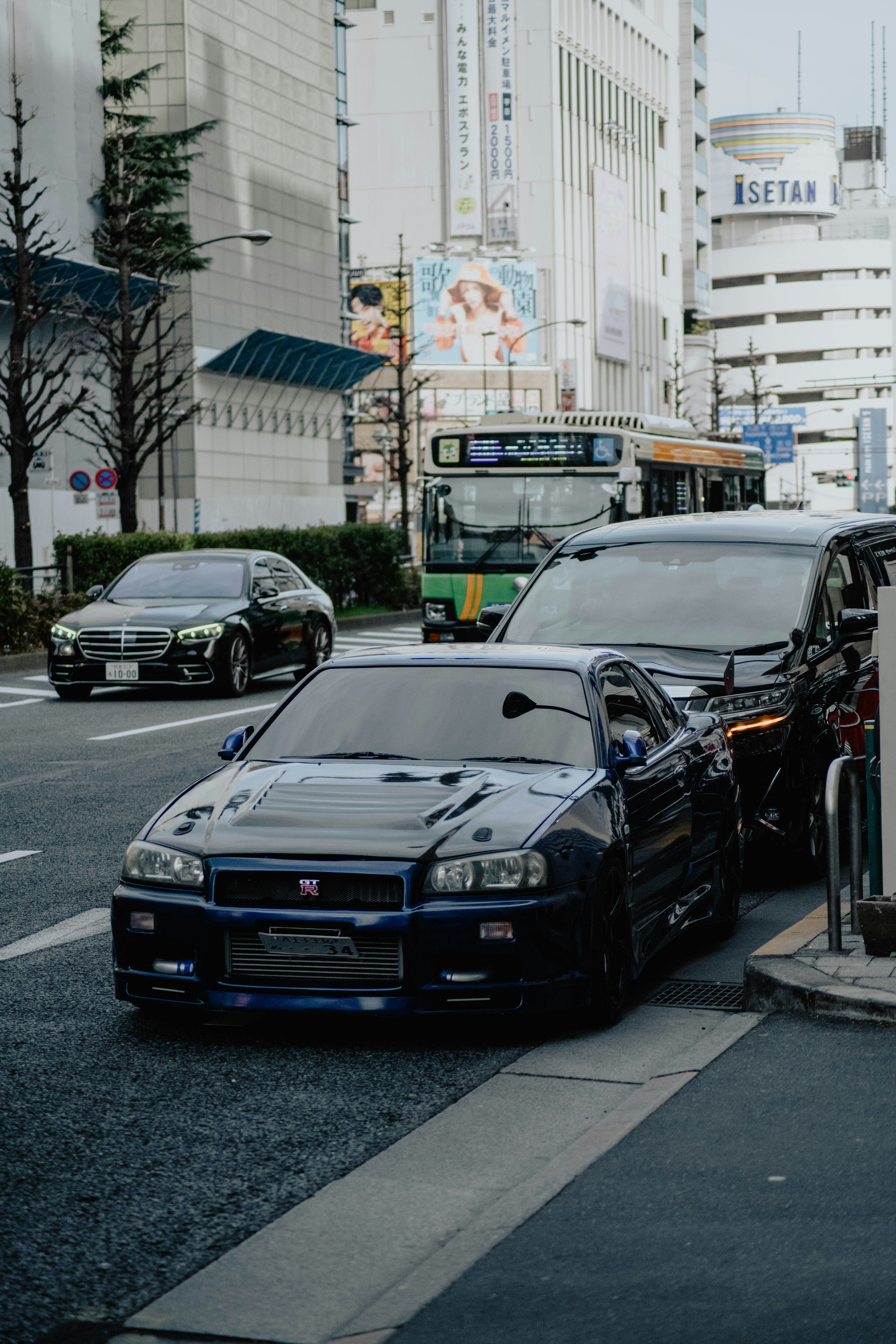 several cars parked on the side of the road