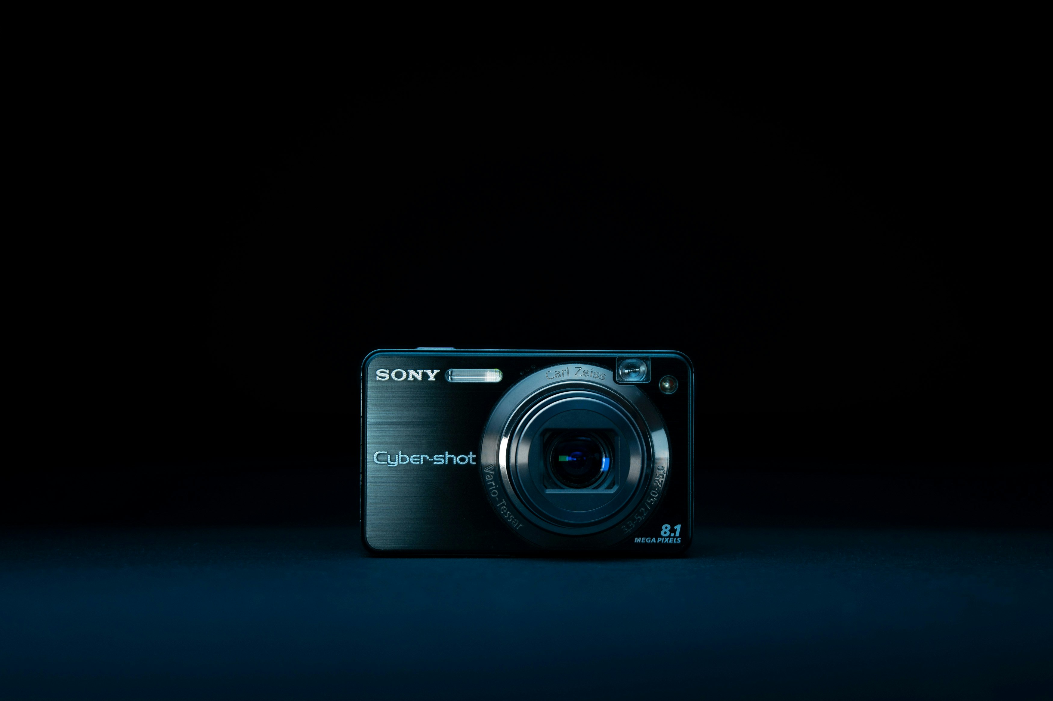 a digital camera sitting on top of a table