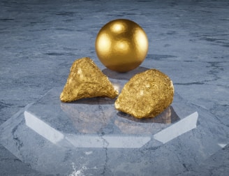 a golden object sitting on top of a table