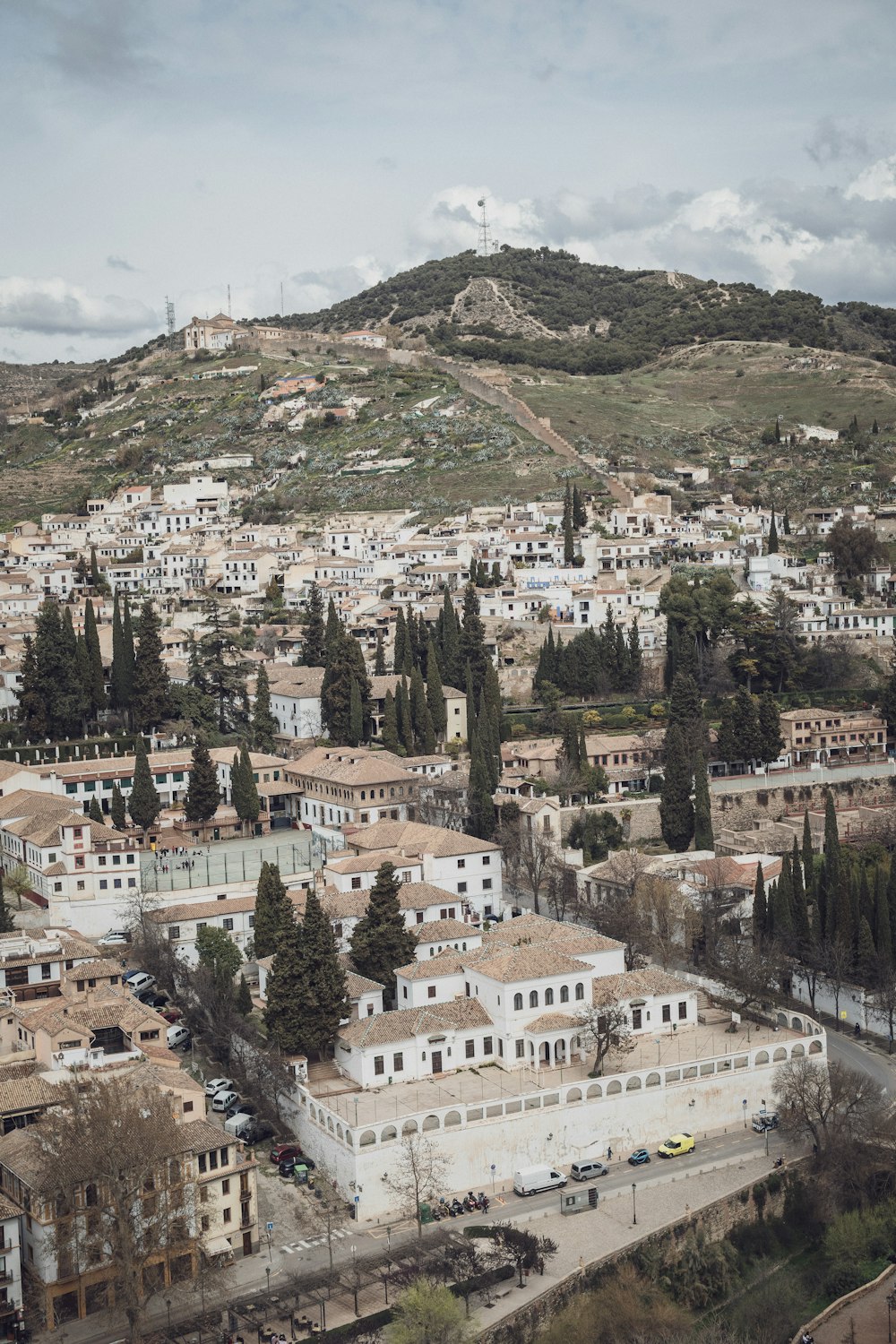 a city with a hill in the background