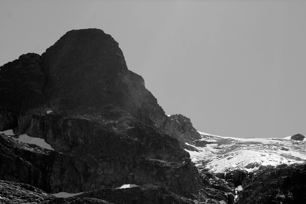 a black and white photo of a mountain