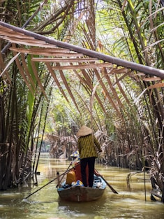 a person in a boat on a body of water