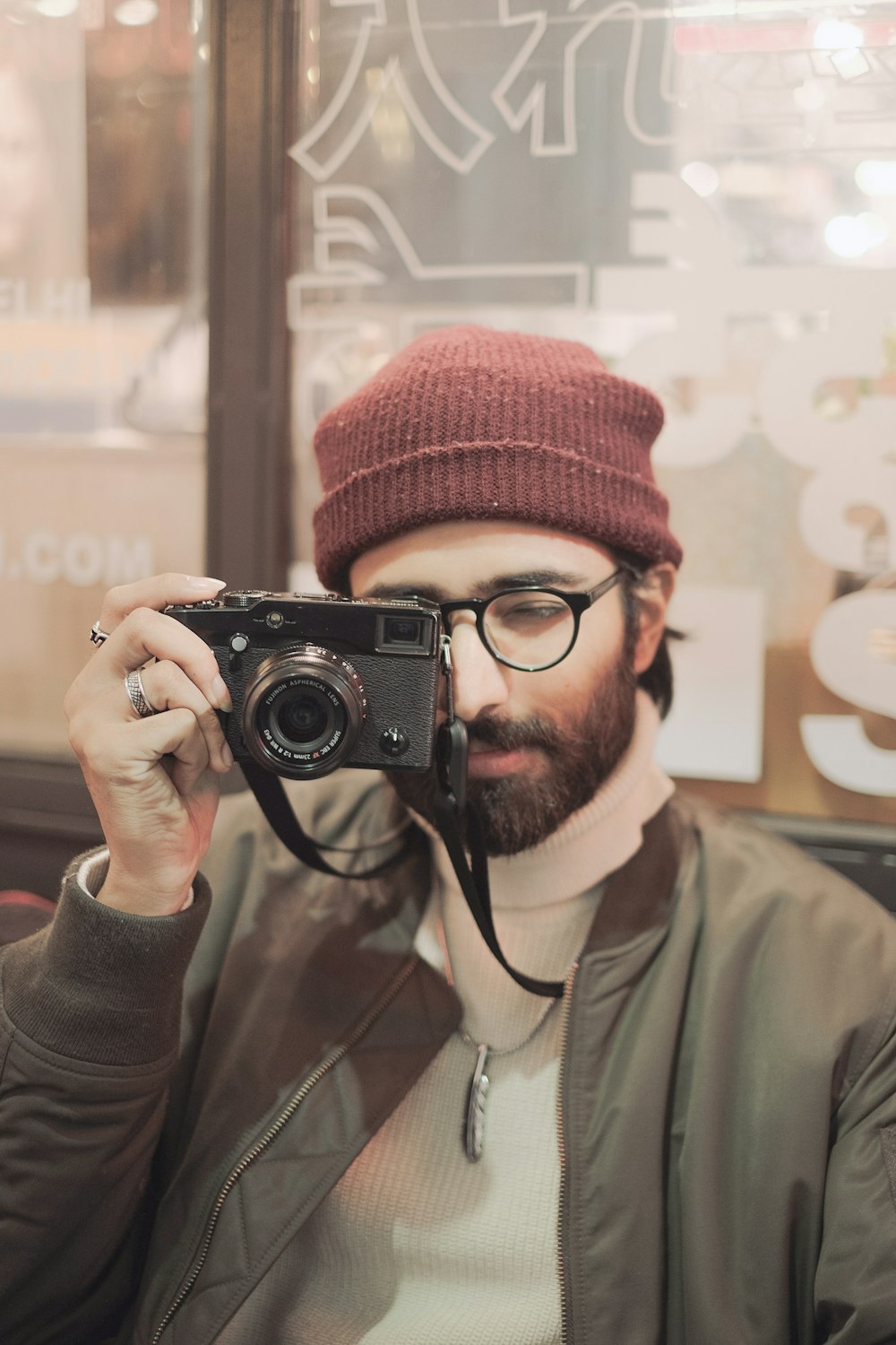 a man taking a picture of himself with a camera