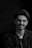 A professional portrait of Ali Reza, a satisfied customer.