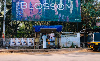 a street scene with a bus and a billboard