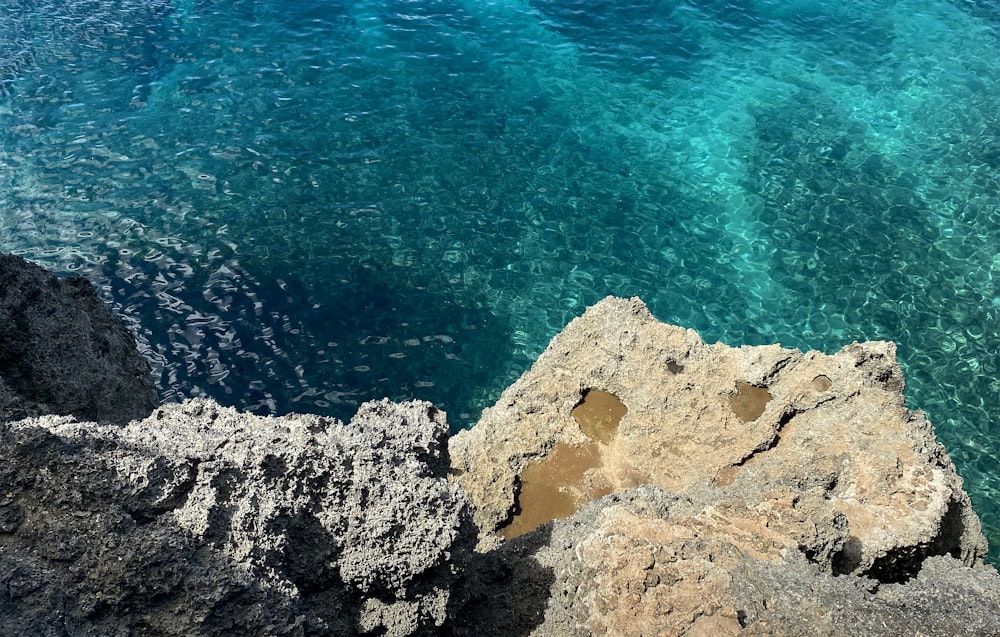 a view of a body of water from a cliff