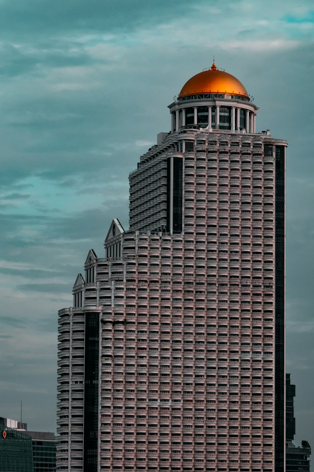 a very tall building with a dome on top