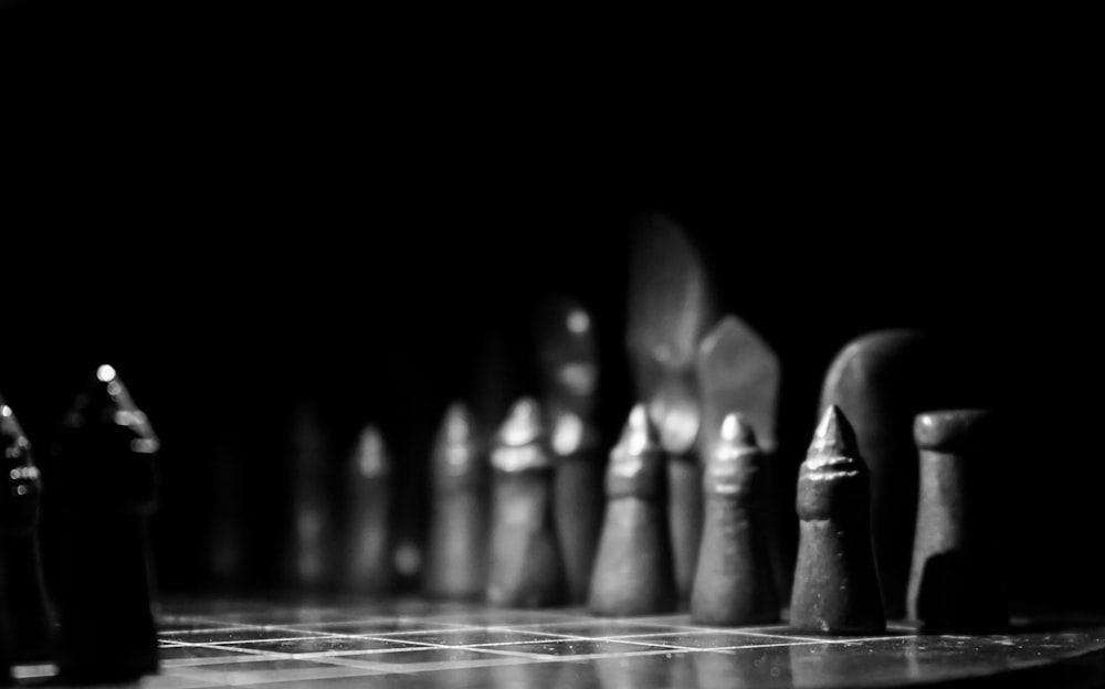 a black and white photo of a chess board