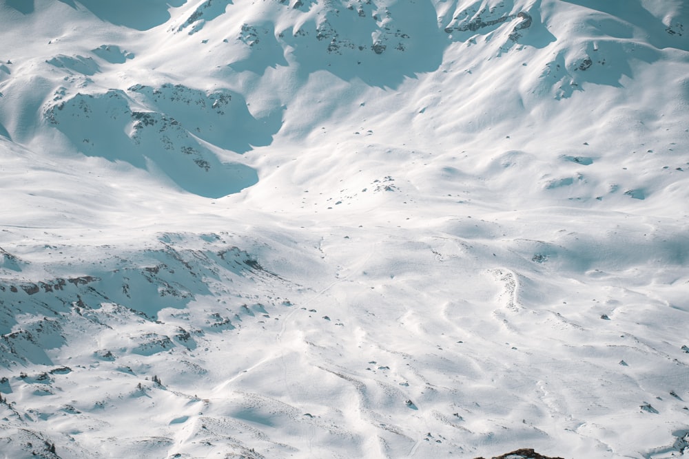 a person on a snowboard in the snow