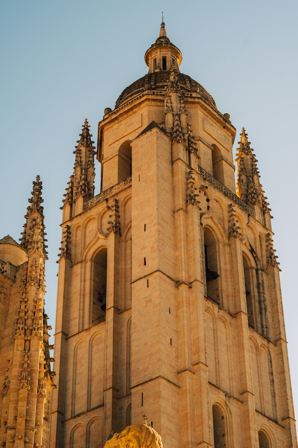 a tall tower with a clock on the top of it