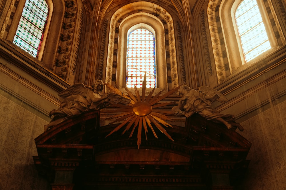 a large cathedral with a clock and stained glass windows