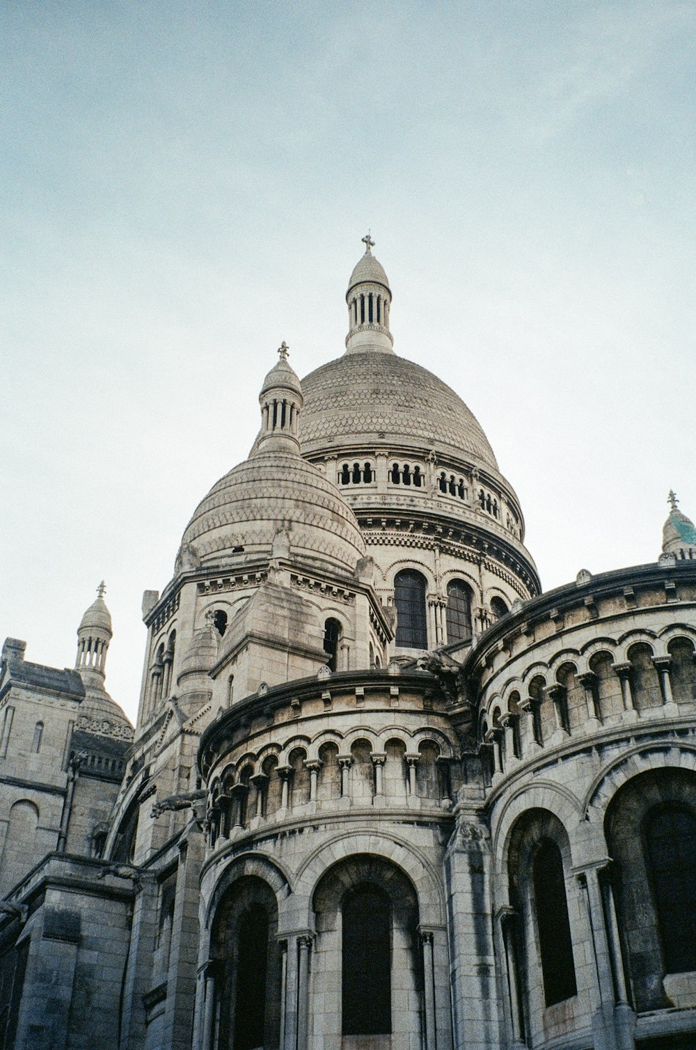 a large building with a clock on the top of it