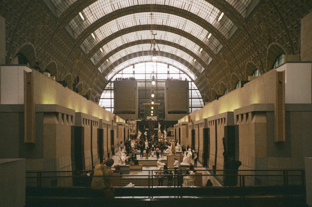 a group of people sitting in a train station