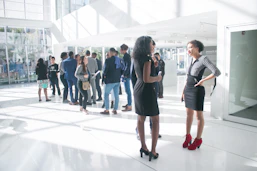 a group of people standing in a room