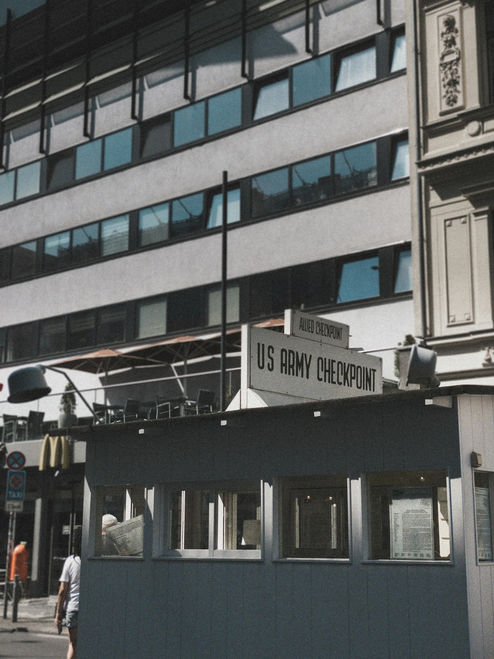 a building with a sign that says u s army checkpoint