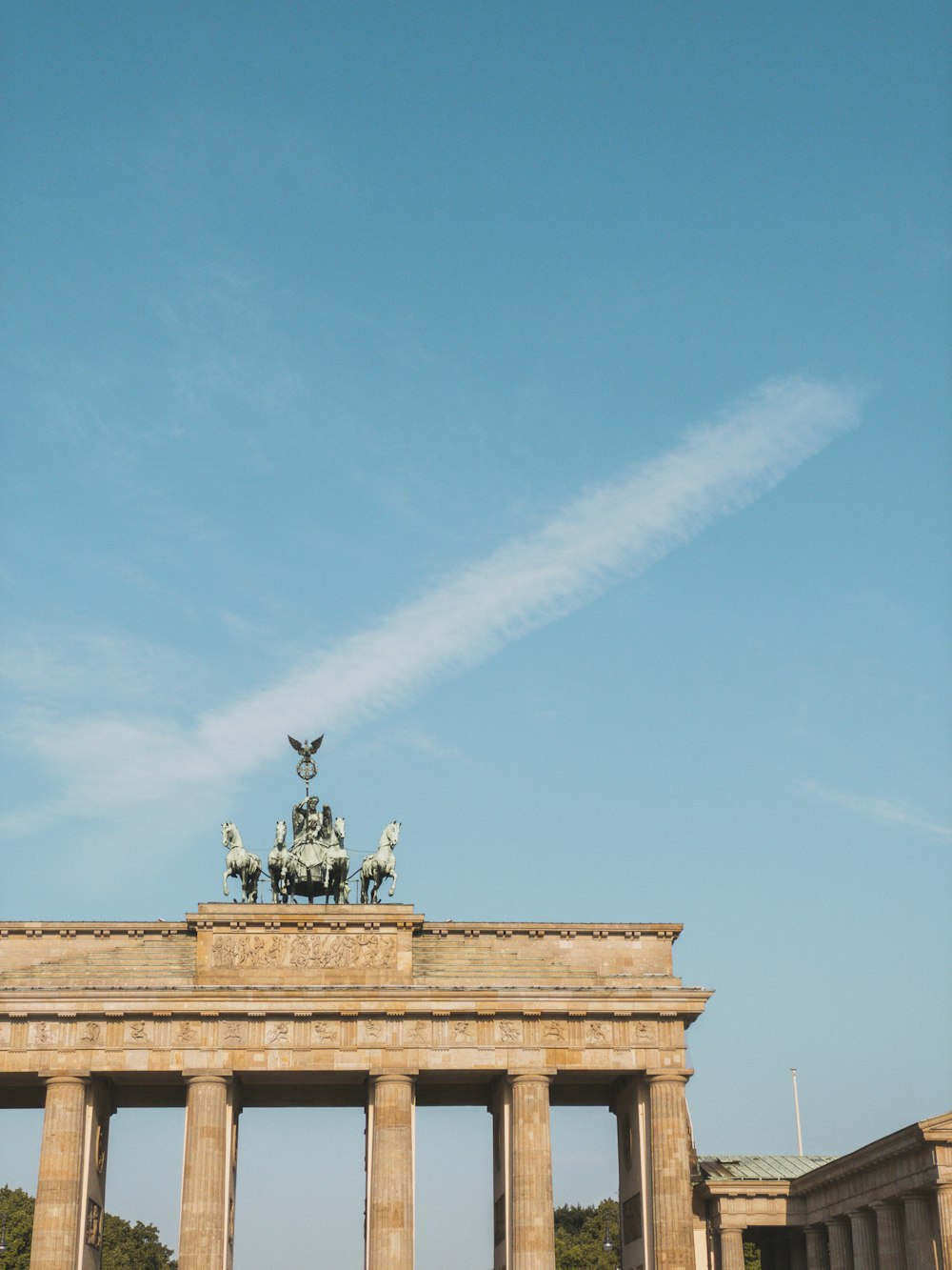 a monument with a statue on top of it