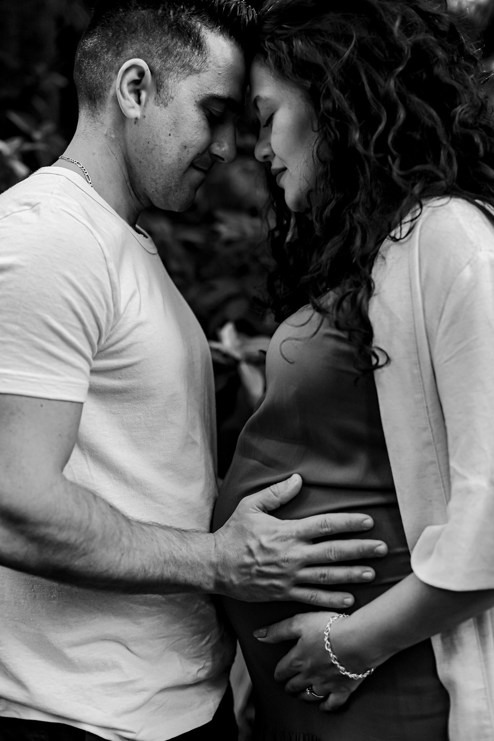 a man and a woman standing next to each other