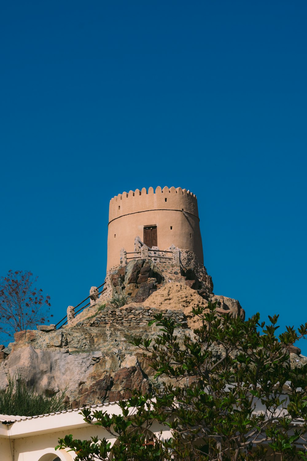 a castle like structure on top of a hill