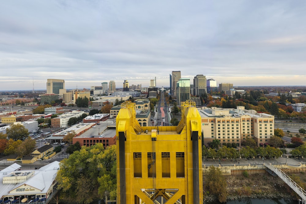 an aerial view of a city with tall buildings