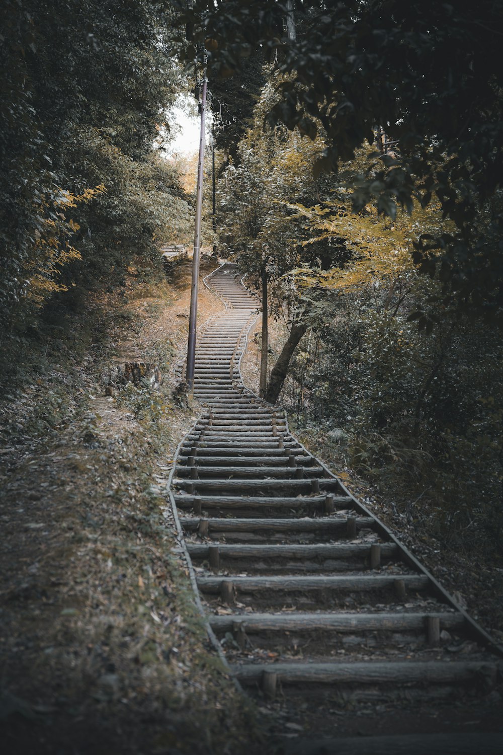 a set of stairs leading up to the top of a hill