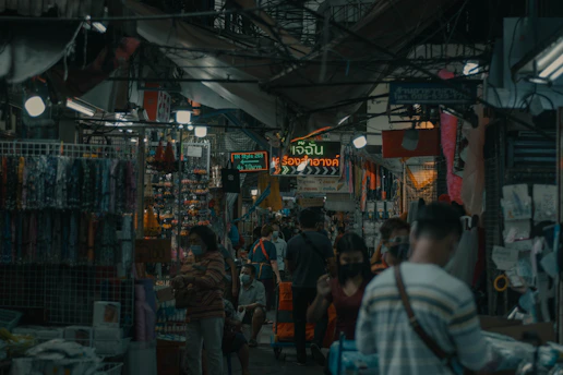 A small group enjoying a private tour in a vibrant local market.