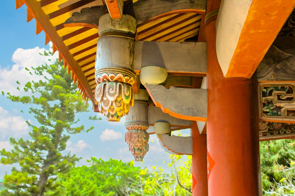 a close up of a wooden structure with a sky background