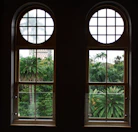 View of the resort’s landscaped gardens from a large window.