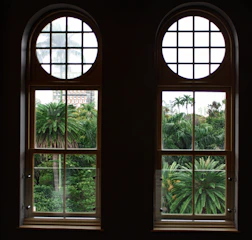 View of the resort’s landscaped gardens from a large window.