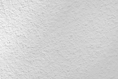 Close-up of a smooth drywall finishing in a home renovation project.