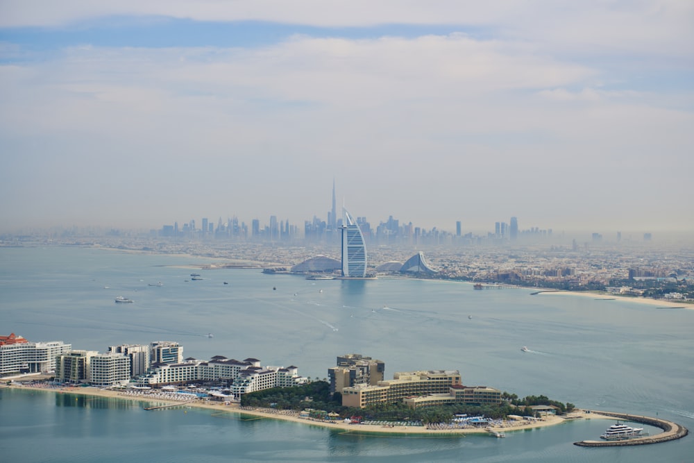 an aerial view of a city and a body of water