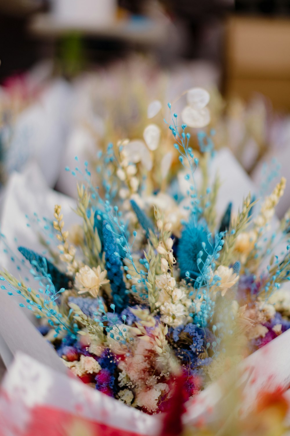 a close up of a bouquet of flowers on a table