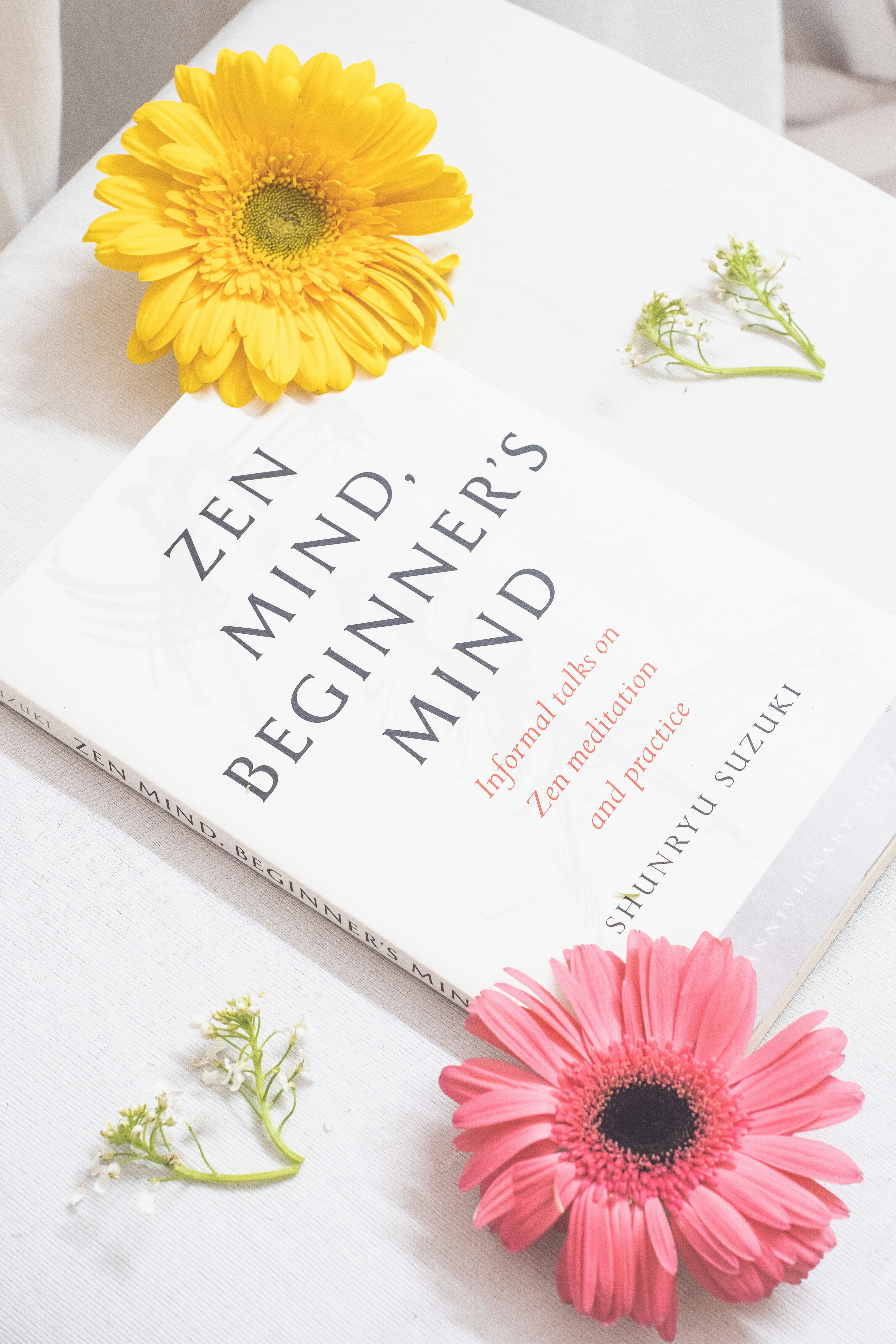 a book sitting on top of a white table
