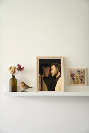 A cozy home setting featuring thoughtful wedding gifts like personalized kitchenware and photo frames.