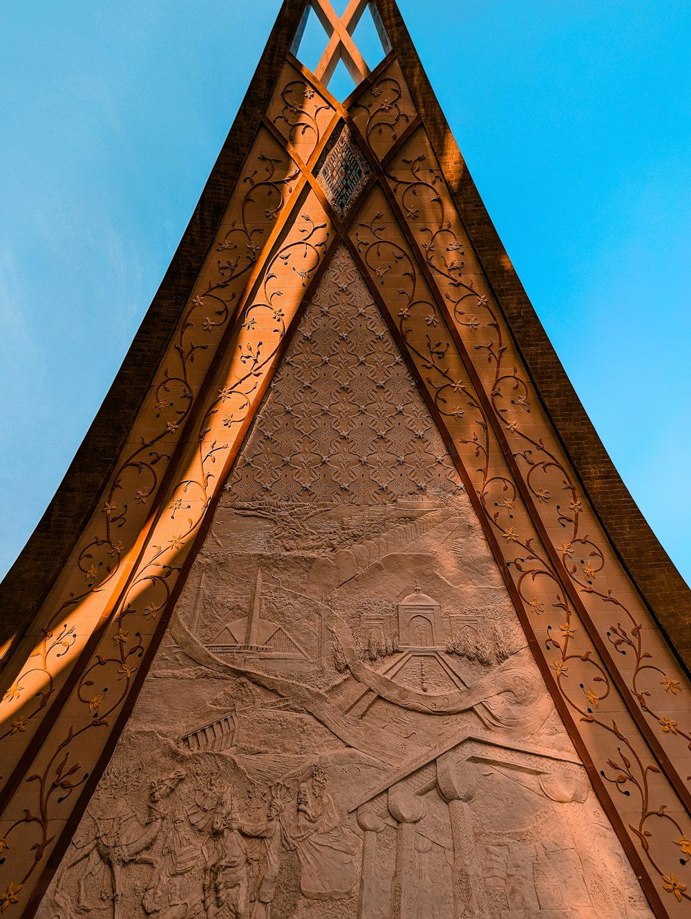 a close up of a building with a sky background