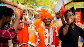 Festive dancers in vibrant traditional attire celebrating a lively Punjab festival outdoors.