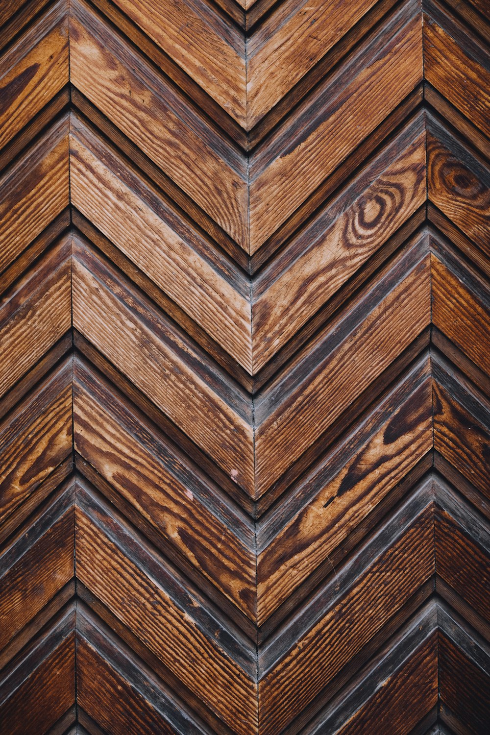 a close up view of a wooden wall
