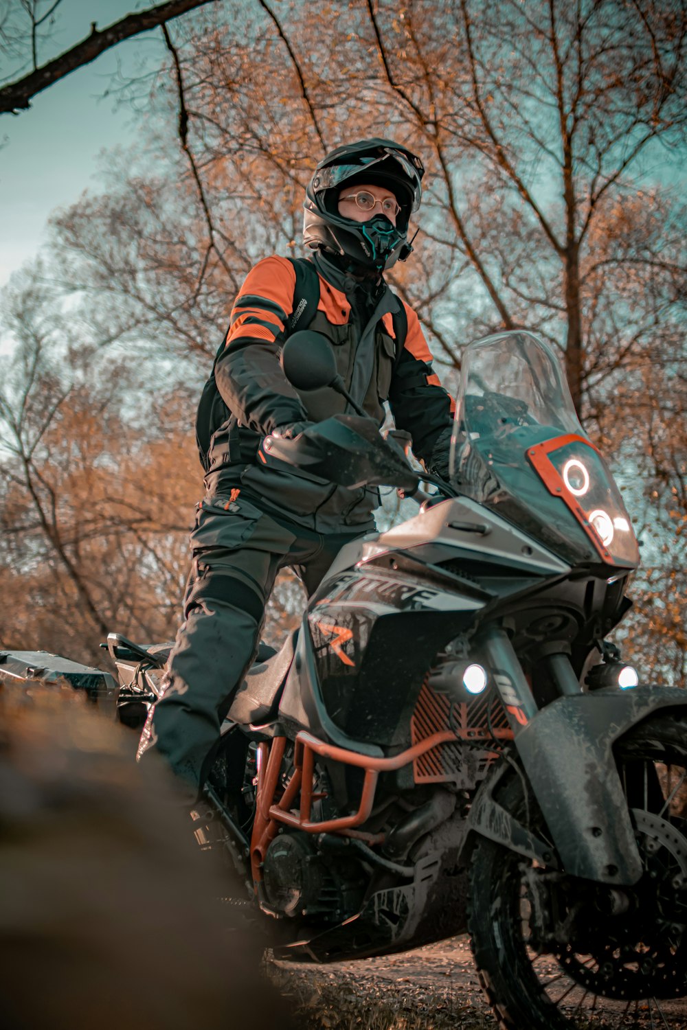 a man riding on the back of a motorcycle