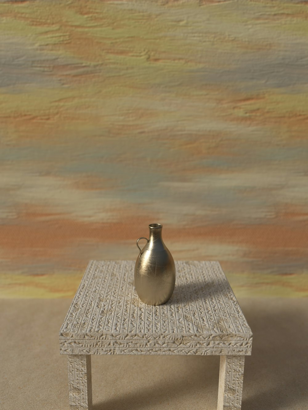 a silver vase sitting on top of a small table