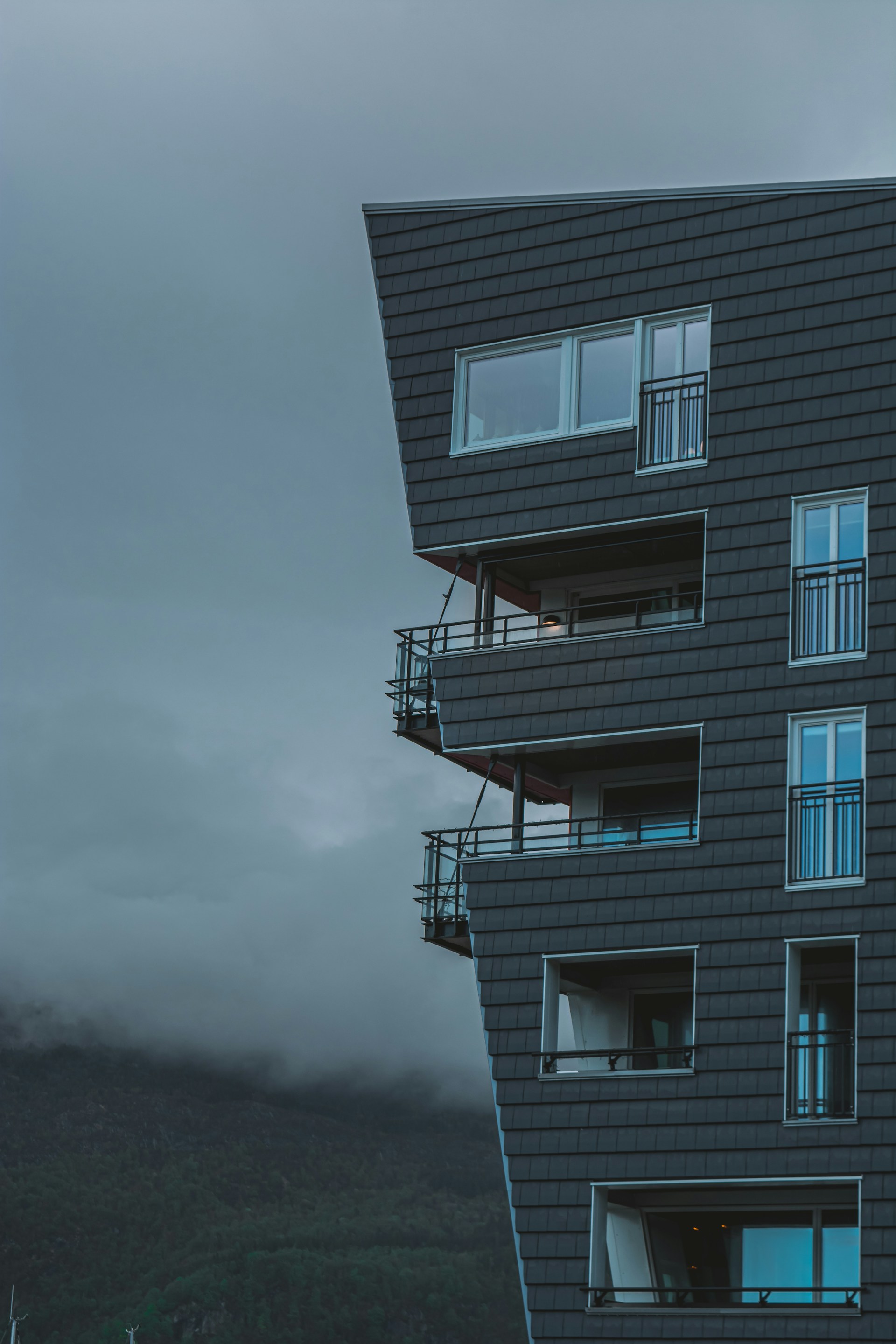 a tall building with balconies and balconies on it
