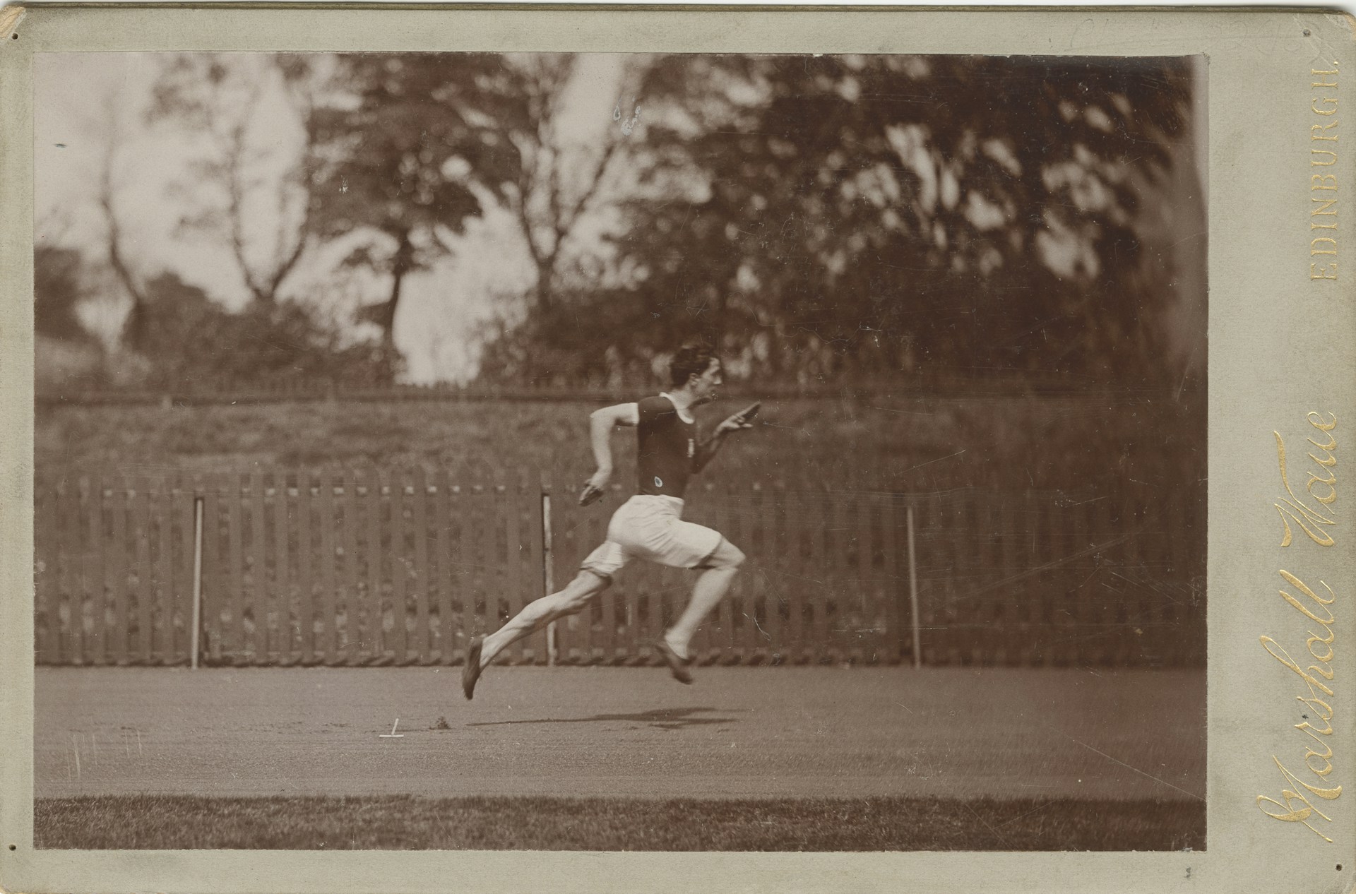 Dynamic action shot of Santiago Ballesteros Suárez sprinting on a sunlit track during training.