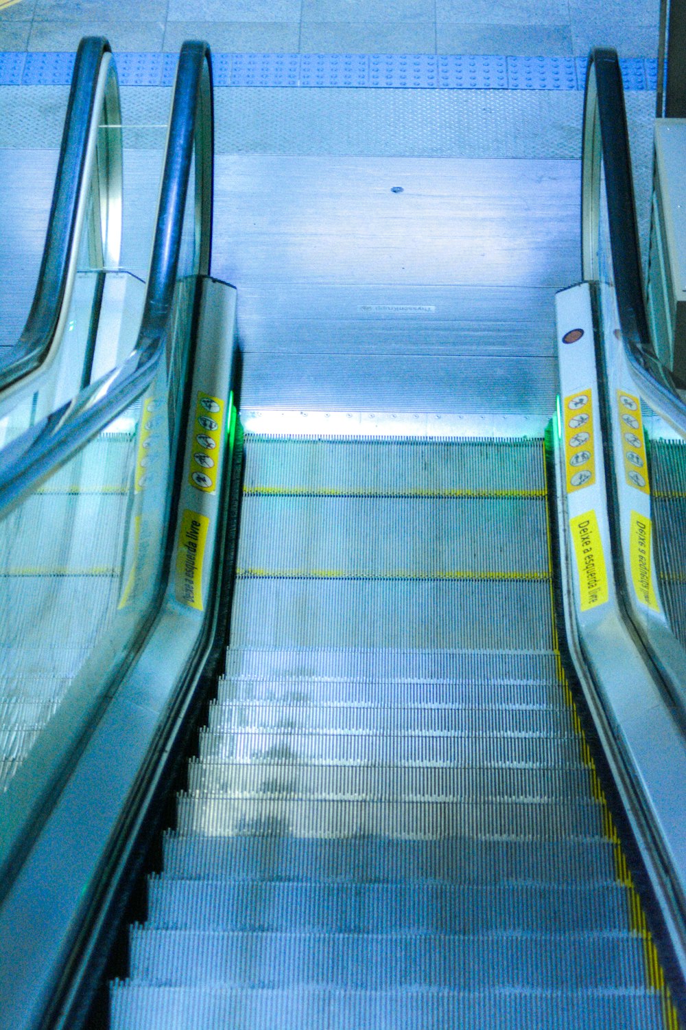 a couple of escalators that are next to each other