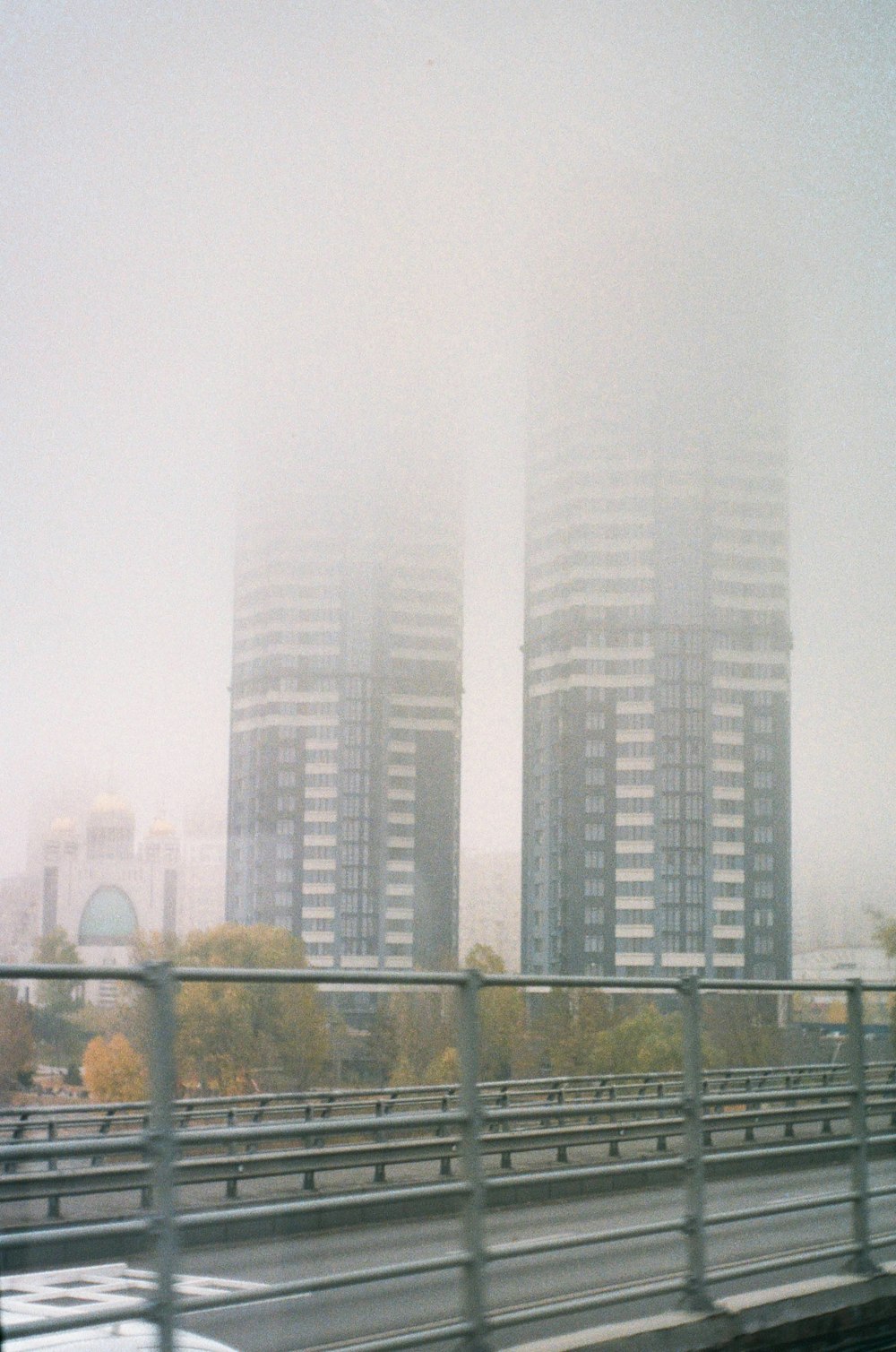 a view of a city from a moving vehicle