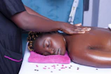 a woman getting a back massage at a beauty salon