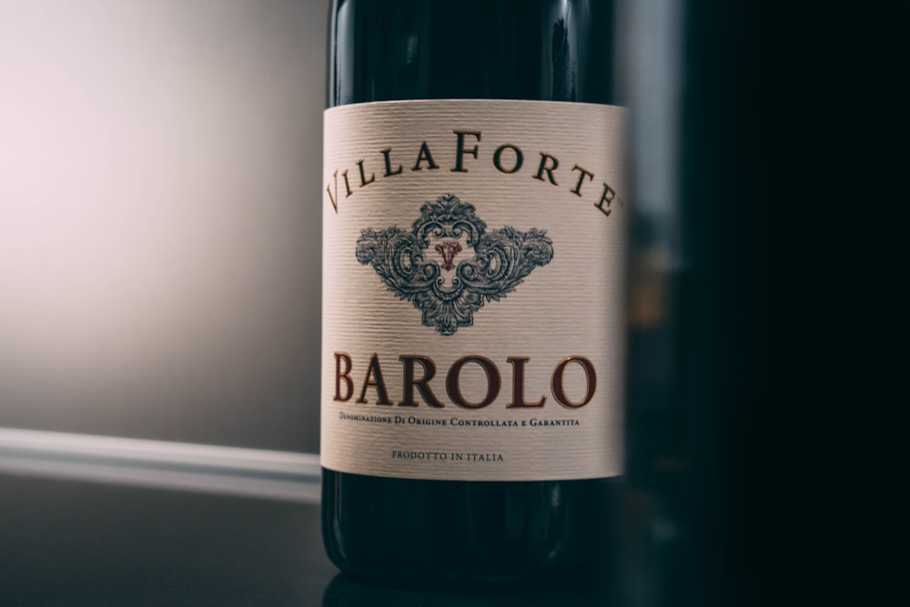 a bottle of wine sitting on top of a counter