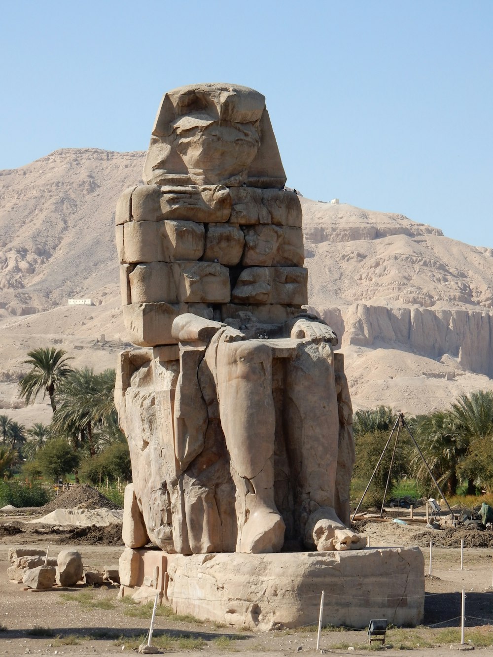 a large stone structure in the middle of a desert